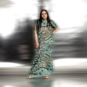 full body view of Women's reef print full-length gown with raised neckline and soft pleated texture – evening occasion wear