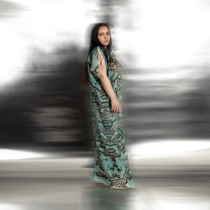 side view of Women's coral reef print gown with drop sleeves and side pleats – sea-inspired long evening dress