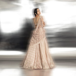 back full length of Women's back view of silk organza lehenga with reef motifs and geometric embroidery – artistic bridal couture set
