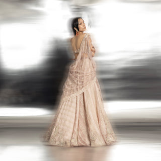 back full length of Women's back view of silk organza lehenga with reef motifs and geometric embroidery – artistic bridal couture set