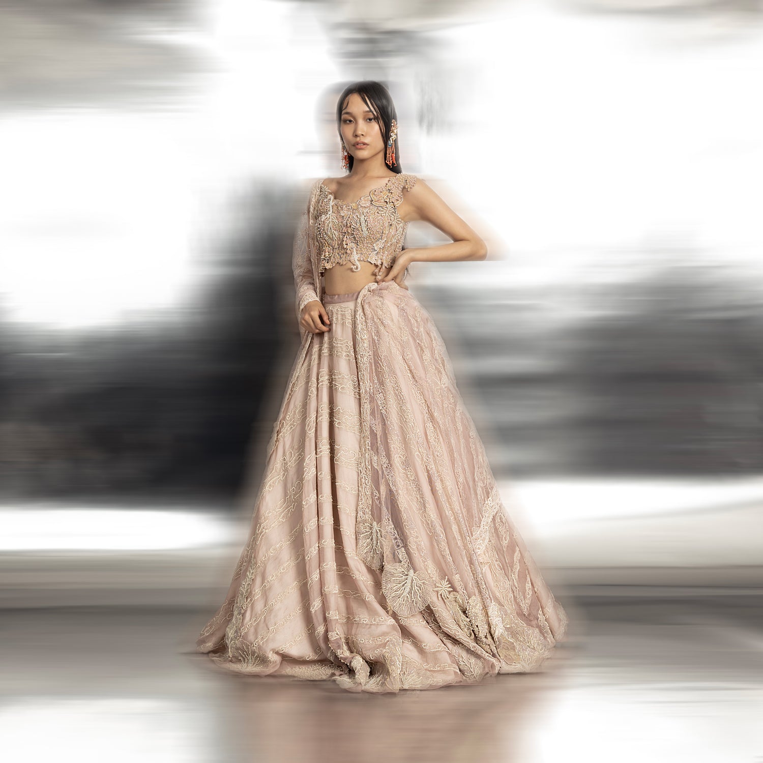front view of Women's pastel silk lehenga with reef embroidery and scallop blouse – elevated couture bridal ensemble