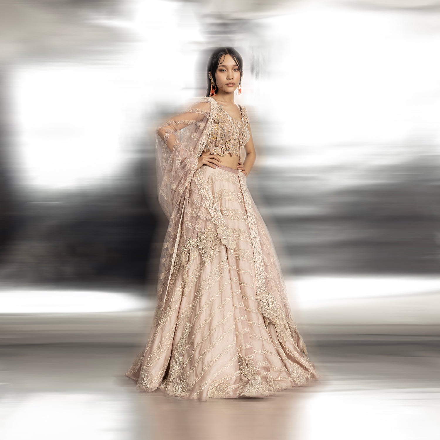 full length of Women's silk organza lehenga with reef-inspired blouse and sheer dupatta – intricate bridal couture set