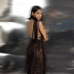 profile shot of Women's sheer embroidered co-ord with open back and structured collar – contemporary formal set