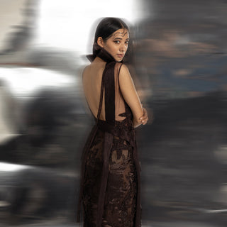profile shot of Women's sheer embroidered co-ord with open back and structured collar – contemporary formal set
