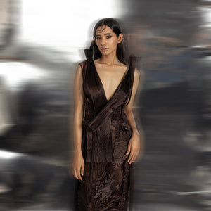 Women's structured sleeveless wrap top with textured overlay and deep neckline – sleek formal set