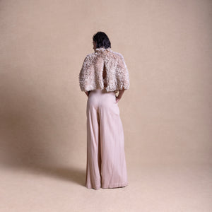Back view of textured fluffy cape and wide-leg pants set -  luxury loungewear with edge, top and trouser, Designer loungewear