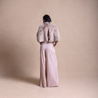 Back view of textured fluffy cape and wide-leg pants set -  luxury loungewear with edge, top and trouser, Designer loungewear