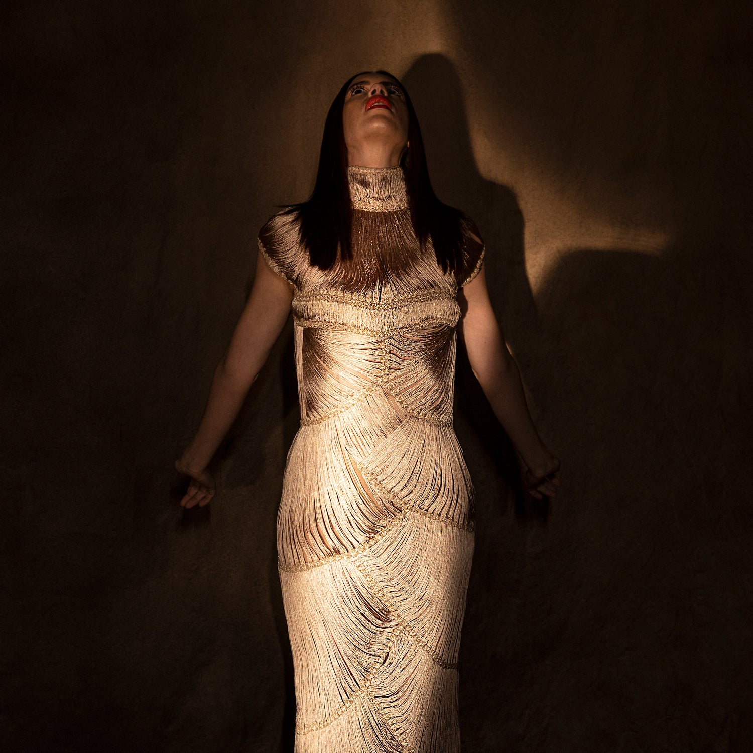 front upperview of Women's high-neck gold fringe gown with sculpted yarn texture and cap sleeves – modern handcrafted couture dress 