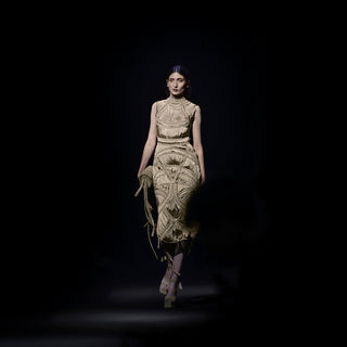 runway view of Women's yarn-sculpted high-neck midi dress with fringe detailing – runway-ready handcrafted fashion statement