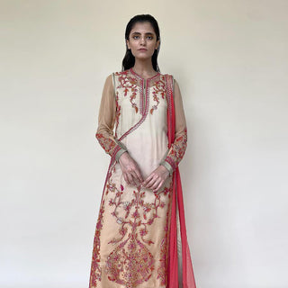 Organza Kurta with fine Resham and sequin embroidery in floral motifs. the kurta is a perfect pick for a simple pooja or function at home. the style has a simple elegant feel and can be styled with elegant gold or Polki earrings. 