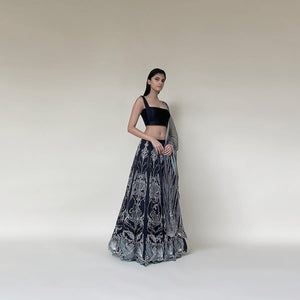 Organza silk lengha with a textured detailed blouse and net dupatta. The Lehenga has nice Gresham and sequin embroidery with a hint of fine pearls. The lehenga has a fine play of pastel colours that makes it unique. Abhishek Sharma, abhishekstudio