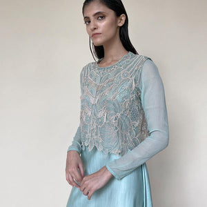 Shear organza crop top tailored with chiffon sleeves and satin draped dress. Top is embellished with intricate sequin/pearl embroidery and bugle beads in forest motifs.  abhisheksharma , abhishekstudio