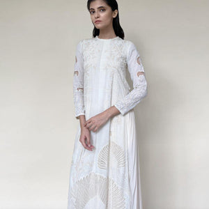 Straight Kurta with fine Resham and pearl embellishment having pleated georgette detailing in the inner layer with wide pants. The kurta is designed taking inspiration from the versatile nature of forest and art of miniature paintings. The look has a delicate and elegant feel and is the best for someone who has a very refined taste of style. The look worked perfectly for a day as well as evening. Abhishekstudio, Abhishek sharma