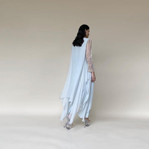 Draped asymmetrical chiffon kurta with embellished sleeves and neckline. The style is very elegant and fluid. The style is comfortable and elegant. The look is a perfect pick for someone who loves the elegance and yet like to be different. The look works perfectly for a day as well as a relaxed evening affair.  
