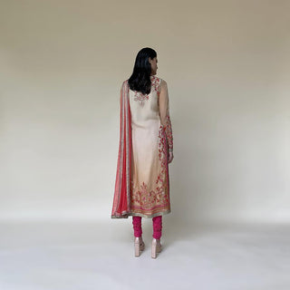 Organza Kurta with fine Resham and sequin embroidery in floral motifs. the kurta is a perfect pick for a simple pooja or function at home. the style has a simple elegant feel and can be styled with elegant gold or Polki earrings. 