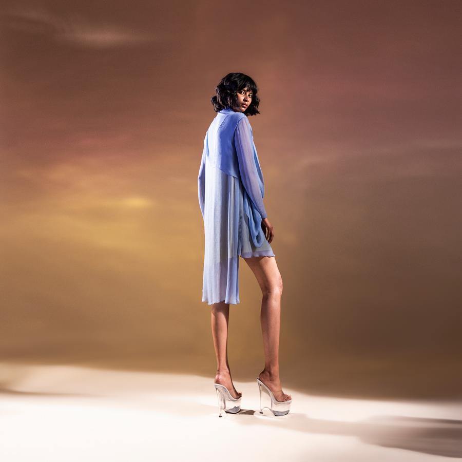 Layered chiffon tunic with cowl drape detailing around the neck. its a flowy top that can be worn as a dress or can be teamed up with fitted pants. Abhishek sharma, Abhishekstudio. 