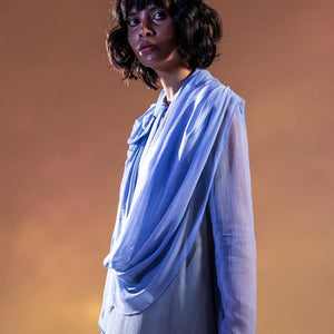 Layered chiffon tunic with cowl drape detailing around the neck. its a flowy top that can be worn as a dress or can be teamed up with fitted pants. Abhishek sharma, Abhishekstudio. 