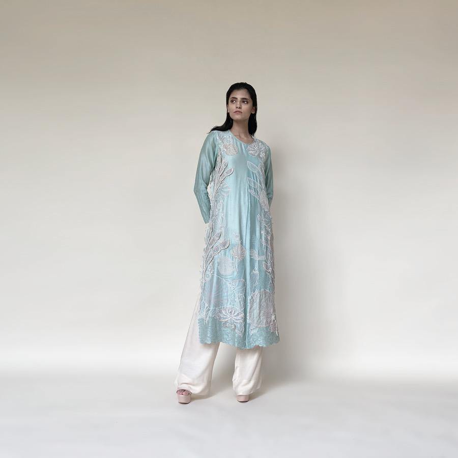 Embellished Kurt with front plate, wide pants and dupatta. The kurta has fine resham and pearl 3D embroidery that adds the elegance to the look. It's a look that works for day and night both. Abhishek Sharma, abhishekstudio.