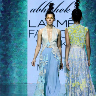 fresh-off-the-runway collection features unconventional draped halter long jacket. The jacket is inspired by the beautiful mountain seance view in the morning hues. The look has a very calming vibe yet with a interesting twist to it. a perfect look for a evening where you are the start. Abhishekstudio, Abhishek Sharma 