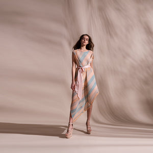 Stripe batik print fine pleated texture draped dress with satin tie up belt. Its a sleeveless look with a crepe inner. The dress is draped in bias and the print appears visually as an interesting mix of bias and vertical stripes. abhishek sharma, abhishekstudio