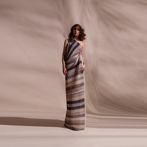 Stripe batik print fine pleated texture draped dress. Its one off shoulder dress with a attached stretch inner. Crafted in fluid fabrics, Abhishek Sharma’s modern statement pieces pack in innovative drapery. abhishek sharma, abhishekstudio