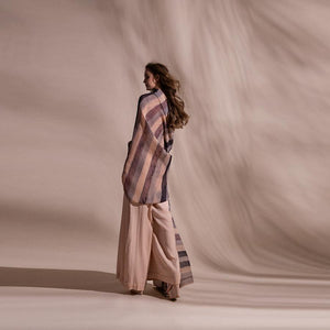Batik stripe print fine pleated texture wrap top teamed up with high waisted chiffon textured wide pants. One off shoulder draped top has an elegant yet young vibe.abhishek sharma, abhishekstudio
