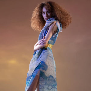 Abhishek Sharma’s fresh-off-the-runway collection features unconventional drapes with printed textures. Impressionist printed fine pleated one off shoulder tie up dress with high side slit. The dress has a young vibe. Ideal for poolside party. You can style the dress with satin tie up belt as shot on model or you can wear a sleek belt to accentuate the waist. Abhishekstudio, Abhishek Sharma 