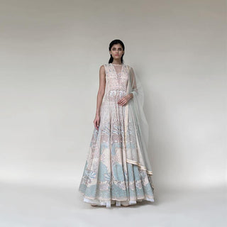Silk organza floor length multi kali anarkali embellished with nice resham, pearl and katdana detailing. there is a fine play of various textures and motifs that gives the look a unique feel. The style has a cancan skirt and a net embellished dupatta. the look has elegance and style as the main vibe and looks stunning with diamonds and pearls. abhishek sharma, abhishekstudio