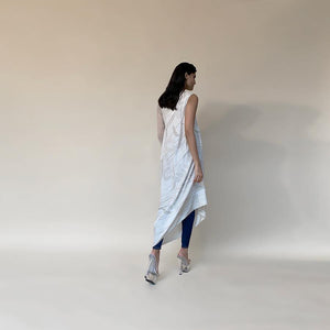 Moss Crepe printed cowled draped dress. The drape is one sleeve style with placement embroidery in fine Resham and pearl. the style can be worn as a dress with a lining or can be teamed up with denim or fitted pants as shot on the model. It's a perfect look for the day when you want be comfortable and elegant. abhishekstudio, Abhishek Sharma