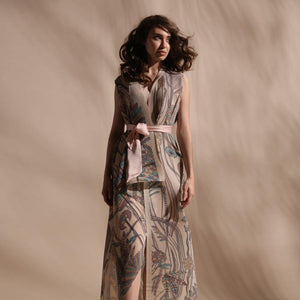 Forest print fine pleated texture layered draped jacket with satin tie up belt. The jacket has a front overlap and a separate crepe inner. The layered jacket has a raised neck. abhishek sharma, abhishekstudio