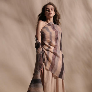Batik stripe print fine pleated texture wrap top teamed up with high waisted chiffon textured wide pants. One off shoulder draped top has an elegant yet young vibe.abhishek sharma, abhishekstudio