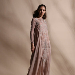 Layered kurta dress gracefully draped in bias cut chiffon is offered with a stretch net pants. Dress is embellished with forest pattern delicate thread and pearl embroidery. abhishek sharma, abhishekstudio