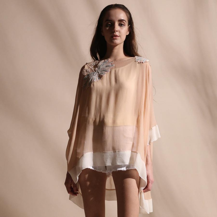Chiffon kimono top with 3D sequin and pearl embroidery. The top is a new take on the traditional kimono. Its a delicate feminine style with contrast hem detailing. The look has a separate moss crepe lining. abhishek sharma, abhishekstudio  