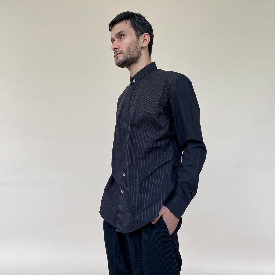 Fine textured shirt in super fine cotton with concealed placket. It features a minimalist square collar and shaped curve hem.  abhisheksharma , abhishekstudio