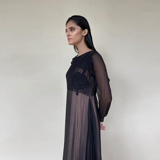 Chiffon long dress with textured and embroidered yoke and contrast lining. The dress has an elegant feel and is apt for dinners or cocktail relaxed evening. There is a play of easy drape and contrast lining to give a punch of colour and add glamour to the look.  Styling: style it with a diamond ring and studs and complete the look a sleek sling bag or a black crystallised clutch. you can also pair it up with black or nude heels. abhishekstudio, Abhishek Sharma 