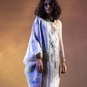 Impressionist printed draped tong tunic with rushed sleeve and placement embroidery. The tunic has a relaxed feel. There is fine resham and bugal bead embellishment along with Fluid form. Abhishekstudio, Abhishek Sharma