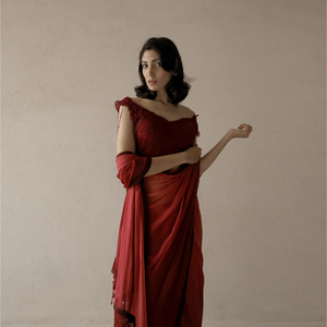 Shaded chiffon saree with wide neck embellished draped embroidered blouse