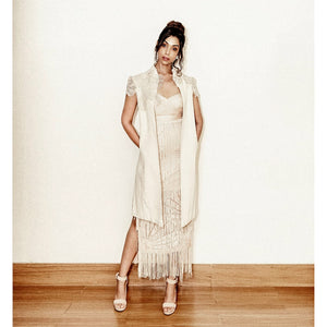 Yarn Textured Calf Length Dress With Fringe Detailing.