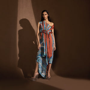 front view of Women's one-shoulder asymmetrical draped dress with rust sash and geometric print – edgy summer tunic for contemporary fashion