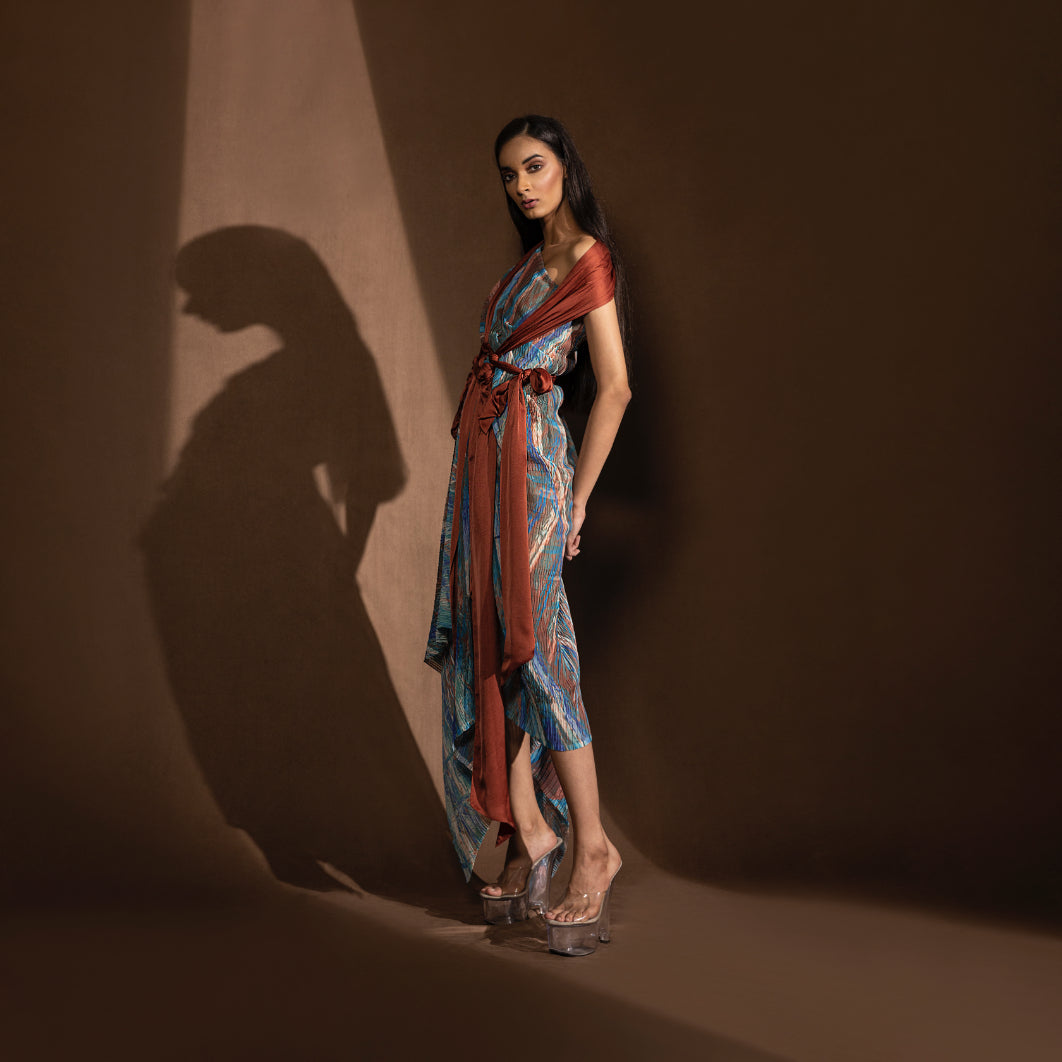 Women's asymmetrical printed midi dress with rust draped sash and shoulder wrap – high-fashion tunic for summer occasions