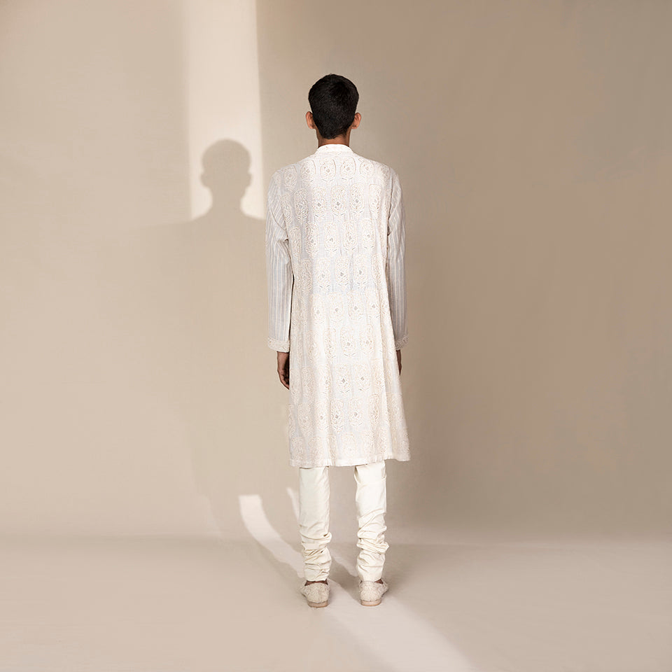 full back view of Men's ivory Chikankari kurta with full-back paisley embroidery and striped sleeves – handcrafted festive attire