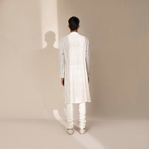 full back view of Men's ivory Chikankari kurta with full-back paisley embroidery and striped sleeves – handcrafted festive attire