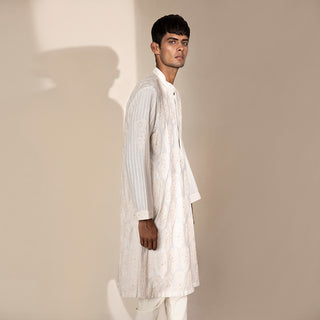 side view of Men's ivory Chikankari kurta with tonal embroidery and striped sleeves – regal handcrafted ethnic attire