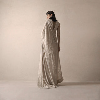 back view of Women's heritage-inspired chikankari saree with fine hand embroidery and deep back blouse – timeless draped couture for formal events