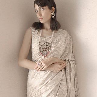 close-up of Women's pre-pleated chikankari saree with fine hand embroidery and statement temple jewellery – timeless bridal couture elegance
