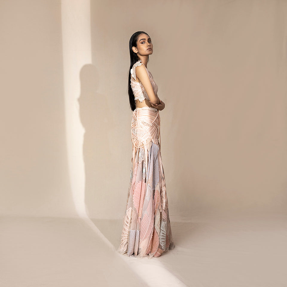 full side shot of Women's pastel embroidered co-ord set with side-tie crop blouse and flared leaf motif skirt – elegant festive wear for sangeet