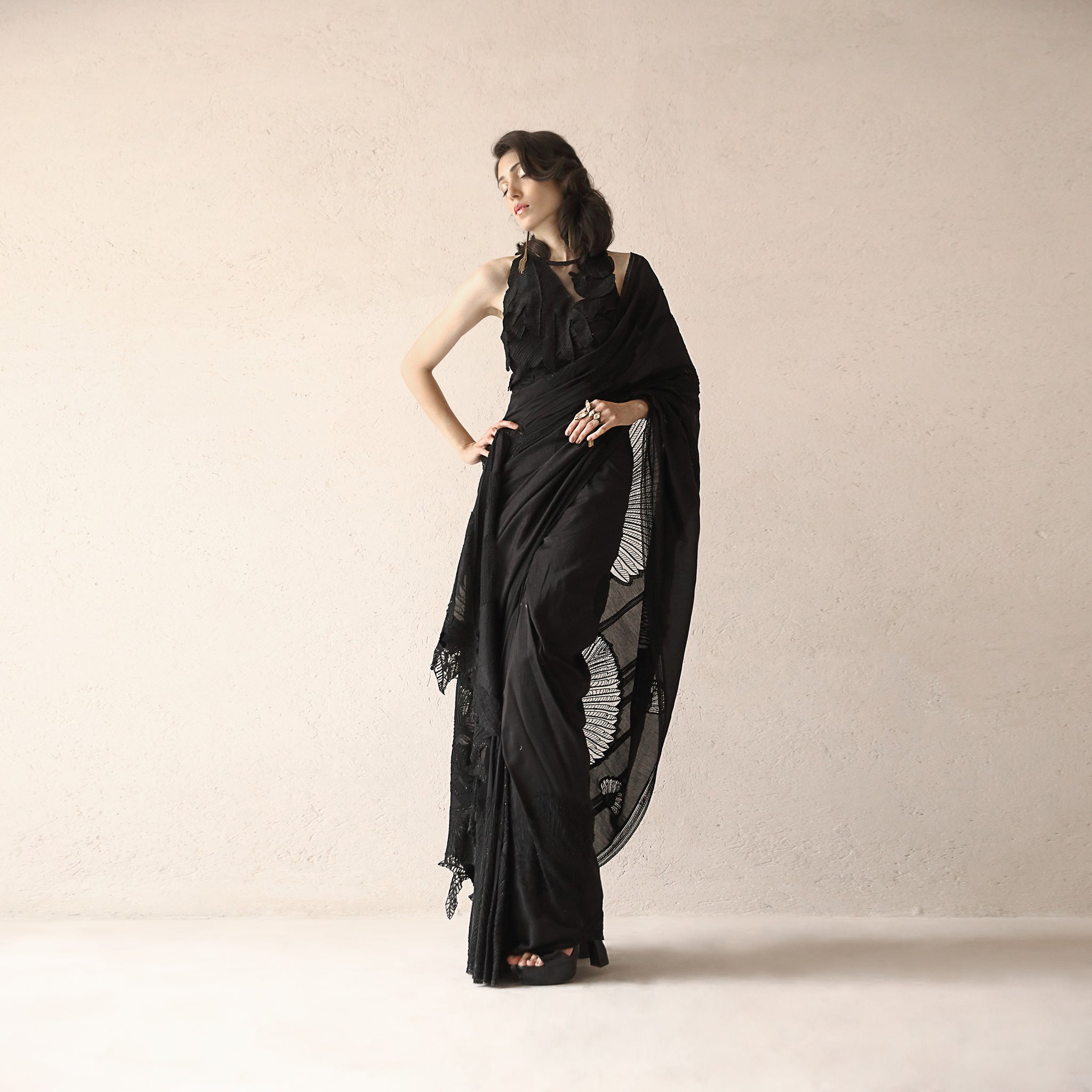 Chanderi Saree with fine Resham and net applique placement embroidery creating a beautiful balance between elegance and style. There is an interesting play of 3D textured draped embroidered blouse balancing the floral feel of the saree making it a  perfect pick for the evening. #Abhishekstudio #abhisheksharma  #fashiondesignerabhisheksharma #designerware #ambawattaone #lakmefashionweek #Saree