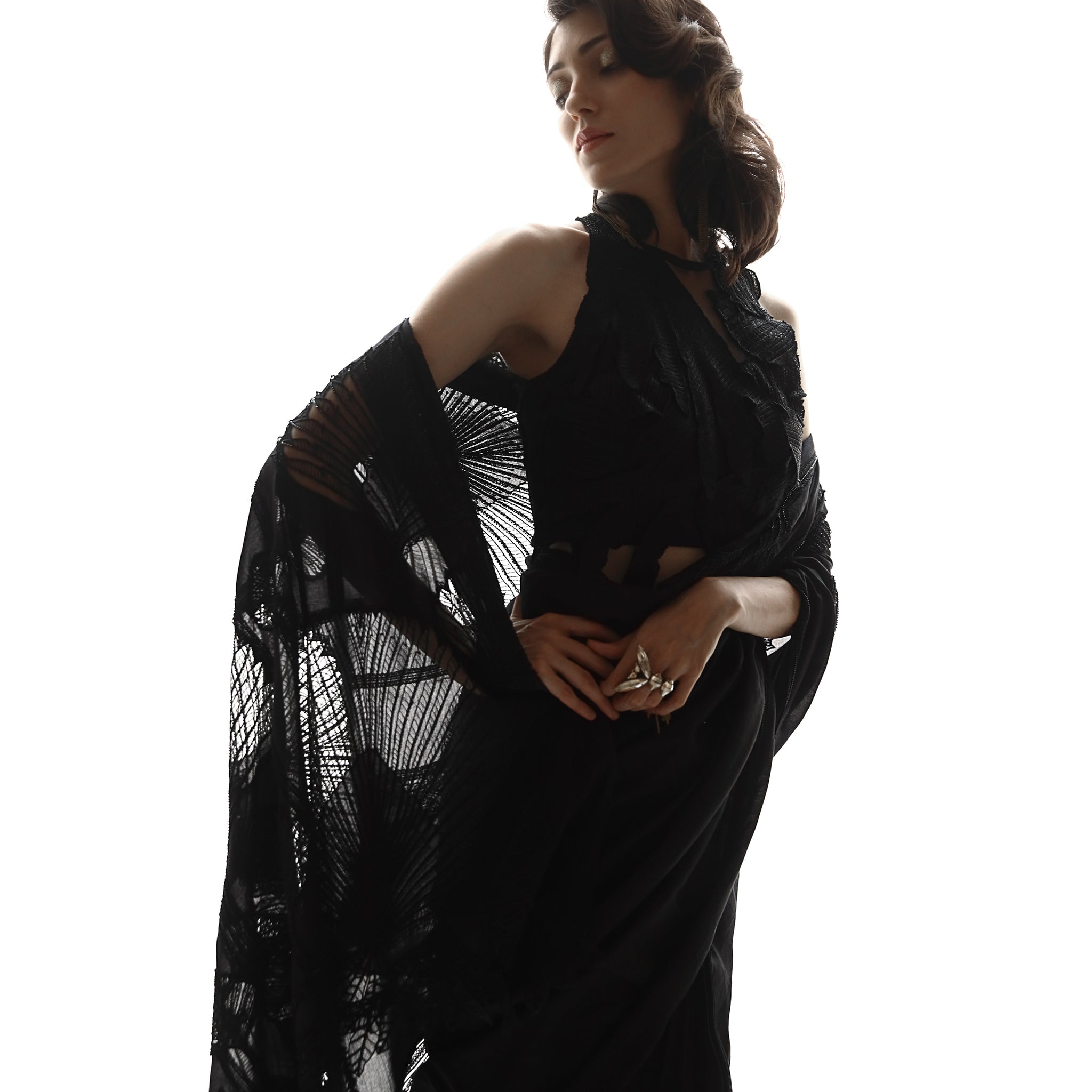 Chanderi Saree with fine Resham and net applique placement embroidery creating a beautiful balance between elegance and style. There is an interesting play of 3D textured draped embroidered blouse balancing the floral feel of the saree making it a  perfect pick for the evening. #Abhishekstudio #abhisheksharma  #fashiondesignerabhisheksharma #designerware #ambawattaone #lakmefashionweek #Saree