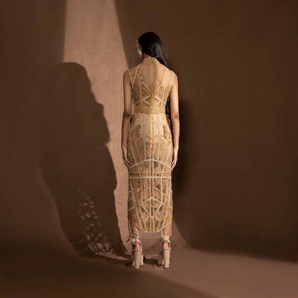 back view of Women's gold calf-length embroidered dress with sheer back panel and halter neckline – modern party silhouette, youngster cocktail look