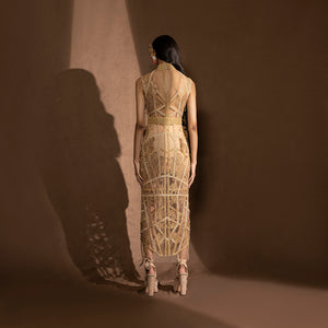 back view of Women's gold calf-length embroidered dress with sheer back panel and halter neckline – modern party silhouette, youngster cocktail look